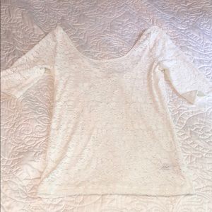Lacy white half sleeve top from Anthropologie